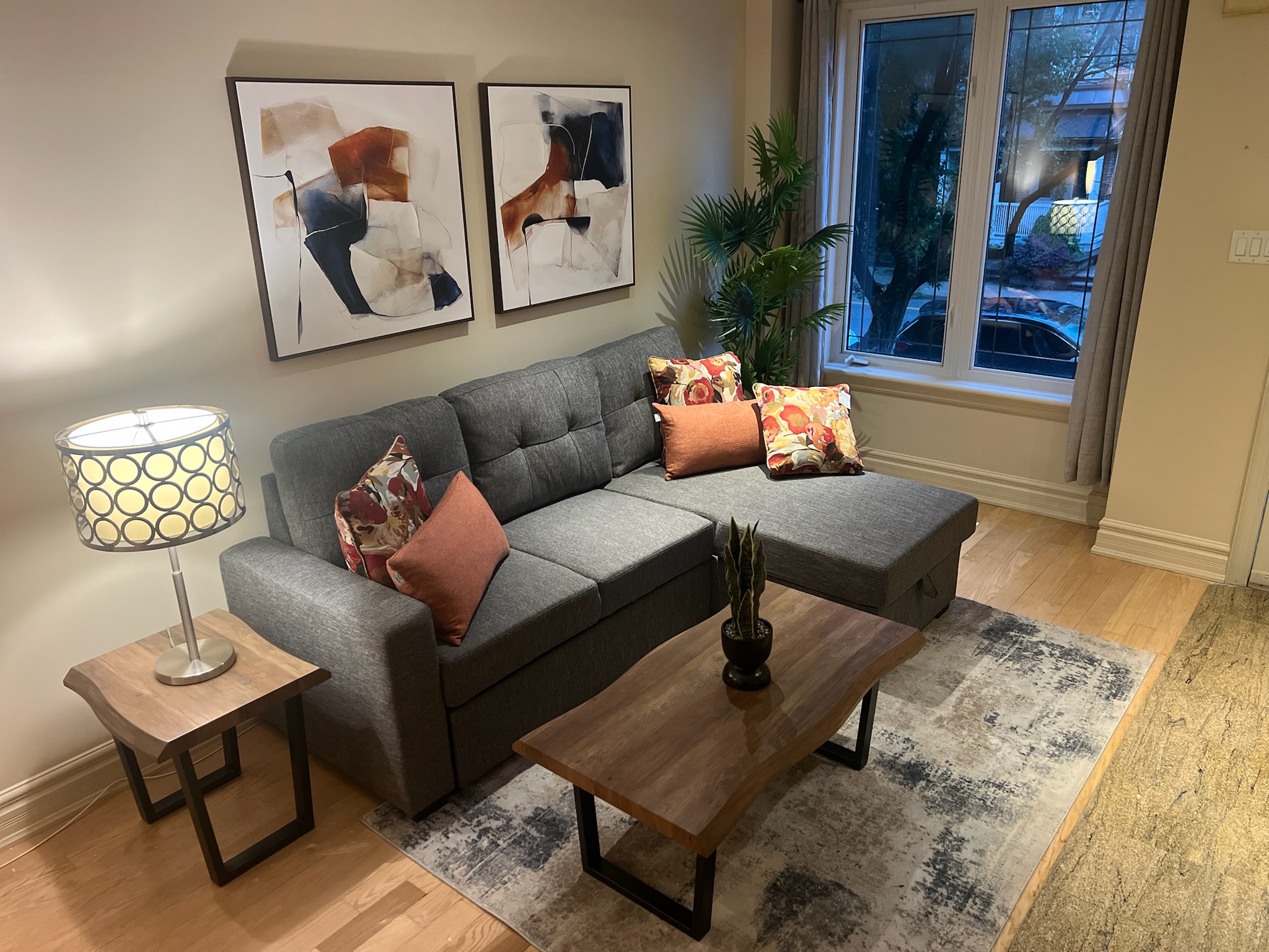 Townhome lounge with sectional and abstract art